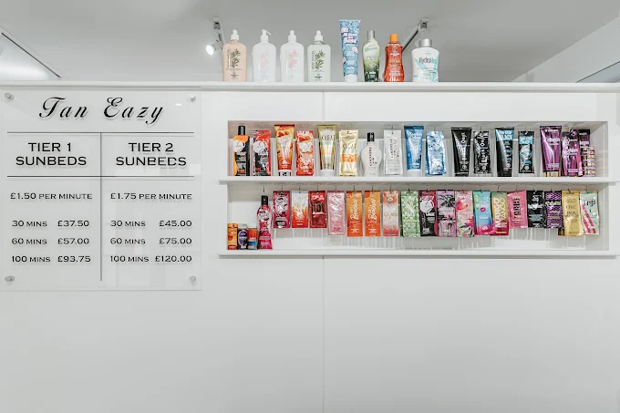 Tanning lotion and cream shelf at Tan Eazy