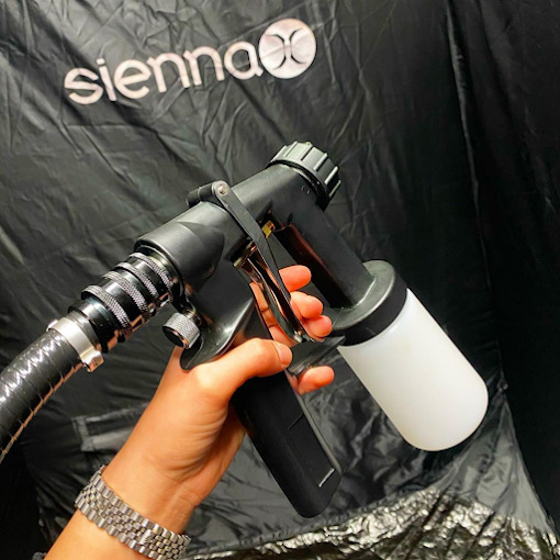 Sienna X spray tan booth at Tan Eazy
